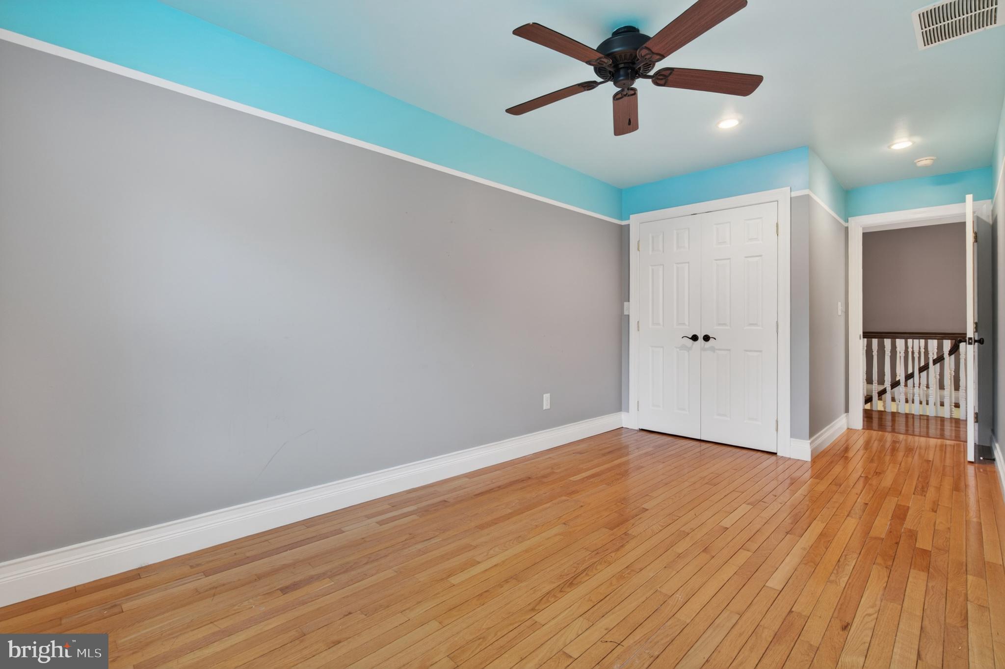 117 State Avenue Lindenwold, NJ 08021 - Photo 34 of 58 a view of a room with wooden floor and a ceiling fan