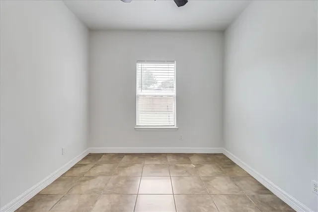 a view of a room that has a window