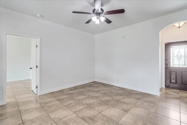 a view of an empty room and window