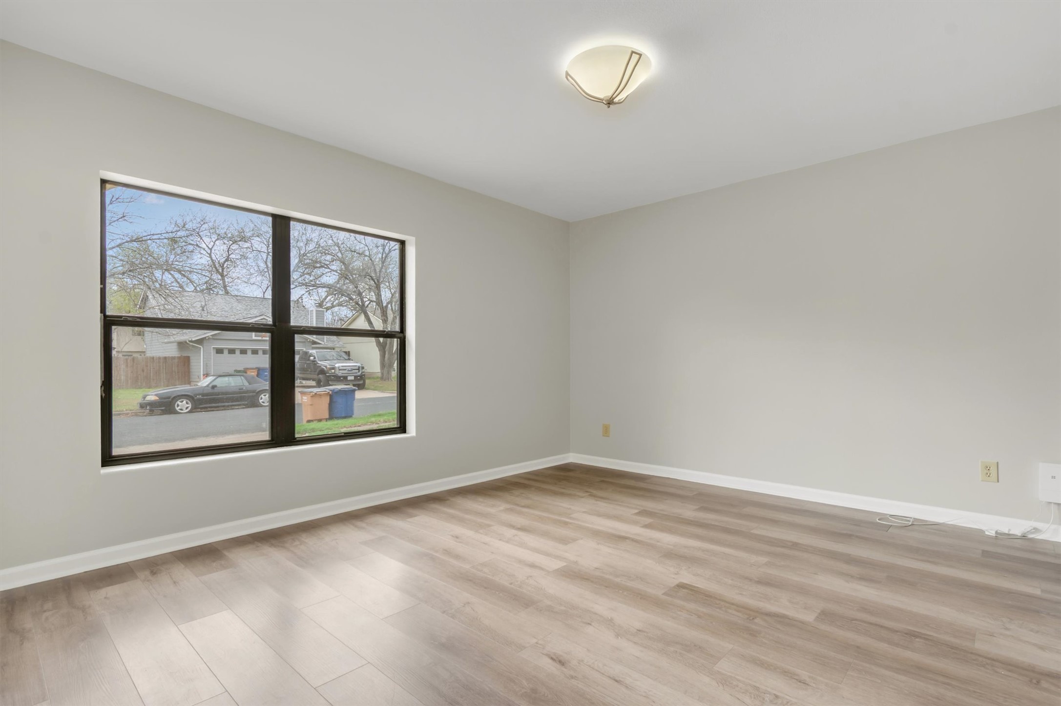 720 Decker Prairie Drive Austin, TX 78748 - Photo 14 of 21 Empty room with baseboards and light wood finished floors
