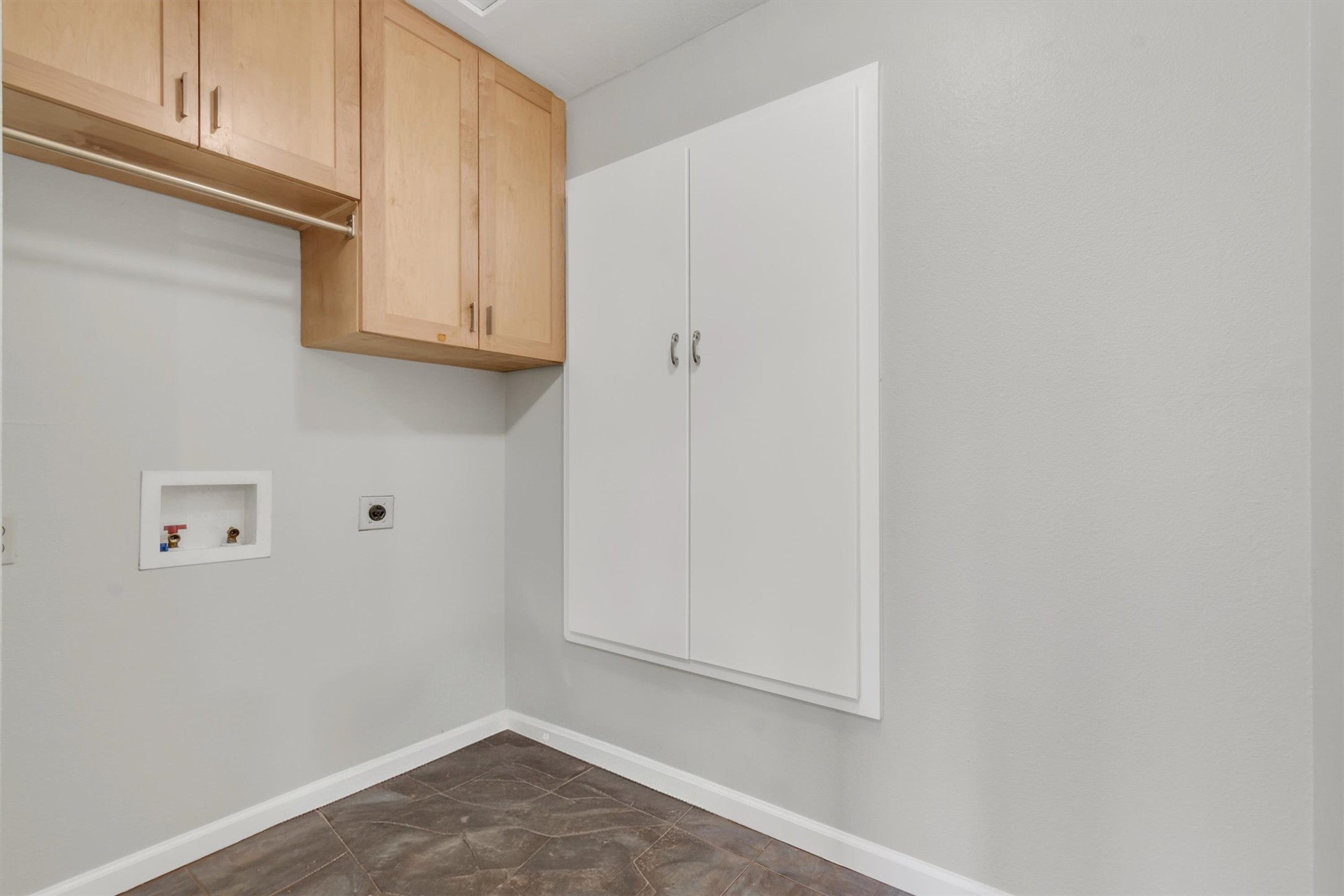 720 Decker Prairie Drive Austin, TX 78748 - Photo 19 of 21 Laundry area featuring hookup for a washing machine, cabinet space, and electric dryer hookup