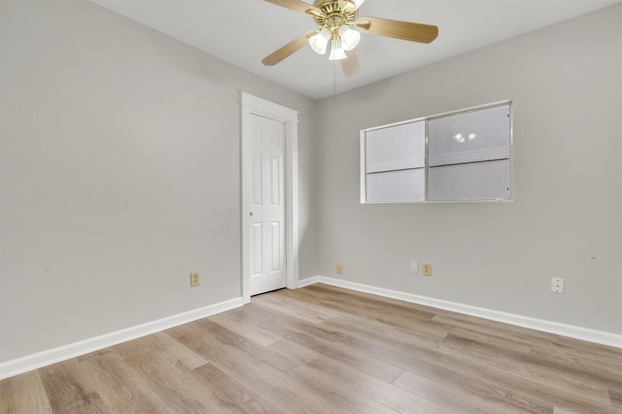 720 Decker Prairie Drive Austin, TX 78748 - Photo 10 of 21 Empty room featuring a ceiling fan and light wood-style flooring