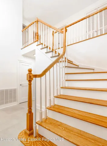 a view of entryway with a front door