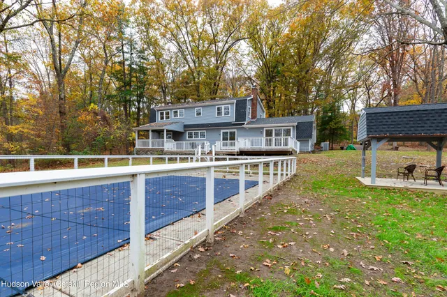 a view of a house with a swimming pool