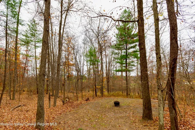 a view of swimming pool with an outdoor space and seating area
