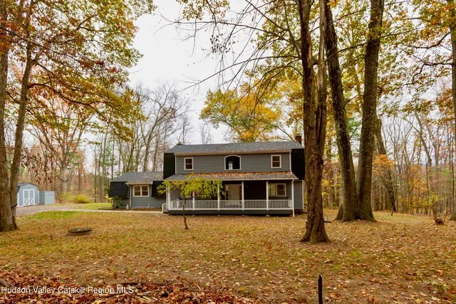 a front view of a house with swimming pool