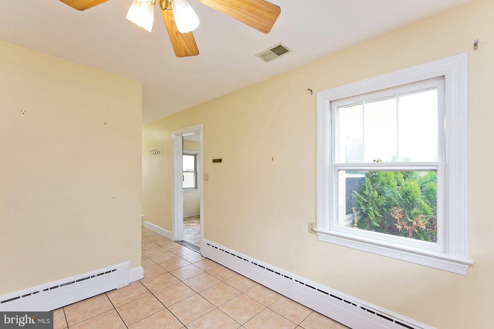 325 Berrys Ferry Road White Post, VA 22663 - Photo 15 of 60 a view of an entryway with wooden floor and a window