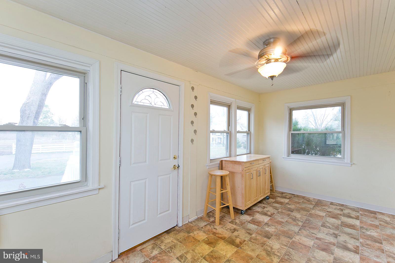 325 Berrys Ferry Road White Post, VA 22663 - Photo 17 of 60 a view of a livingroom with a window and a kitchen