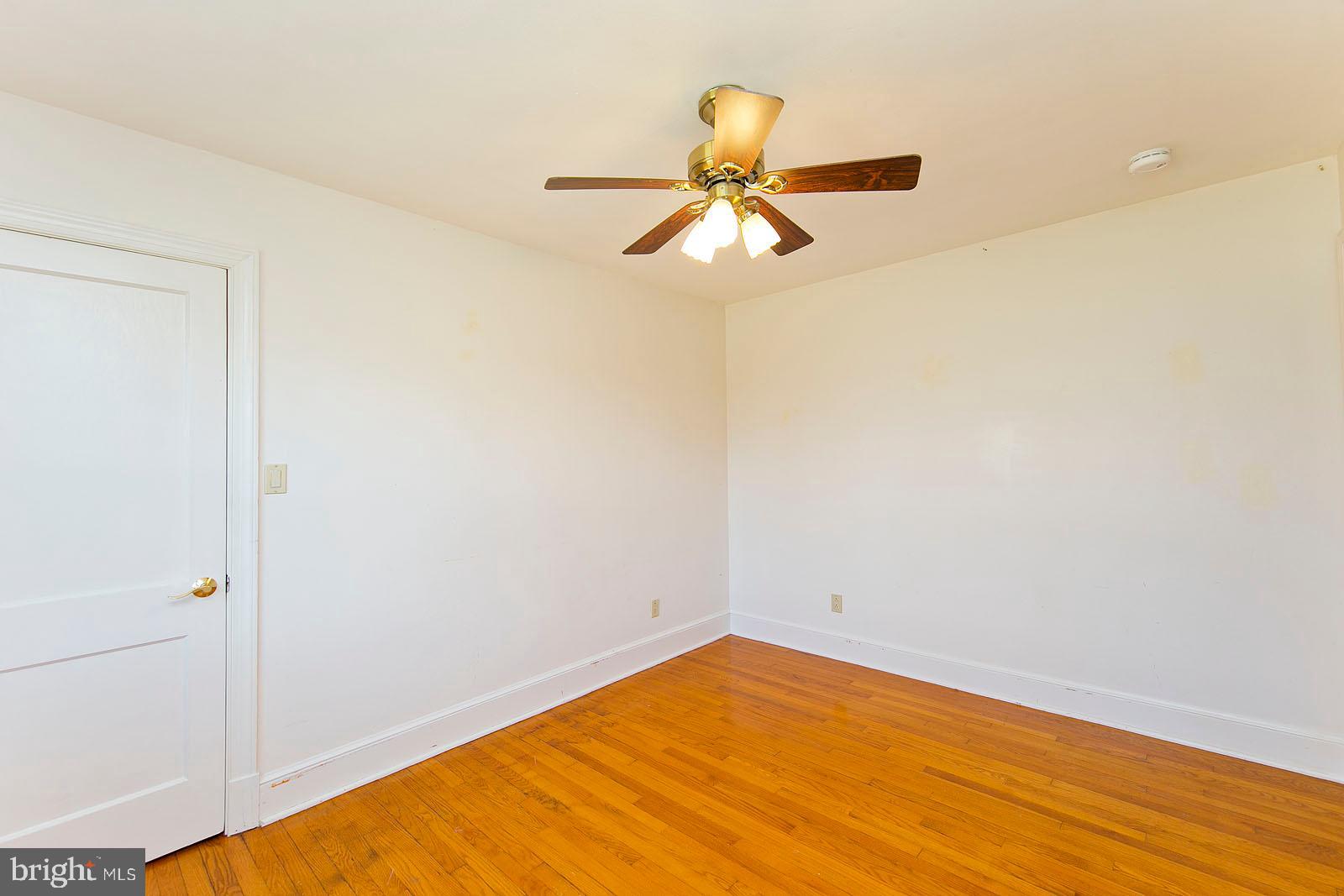 325 Berrys Ferry Road White Post, VA 22663 - Photo 23 of 60 a view of empty room with wooden floor