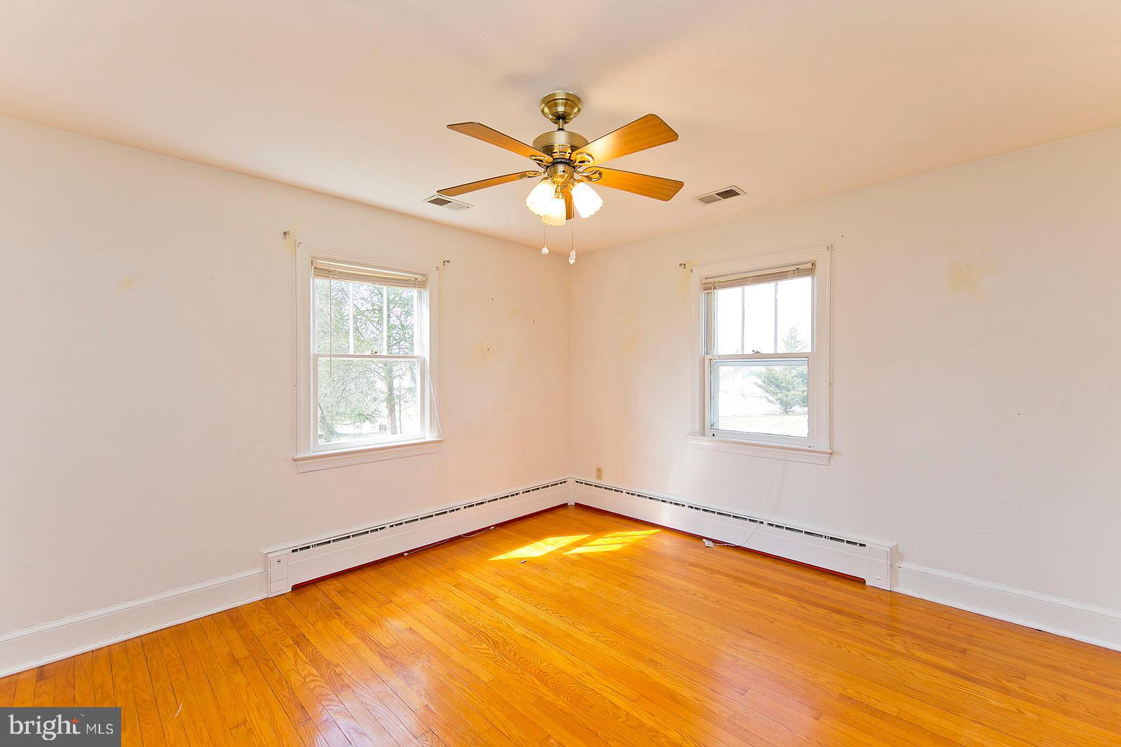 325 Berrys Ferry Road White Post, VA 22663 - Photo 24 of 60 a view of a room with a window and a ceiling fan