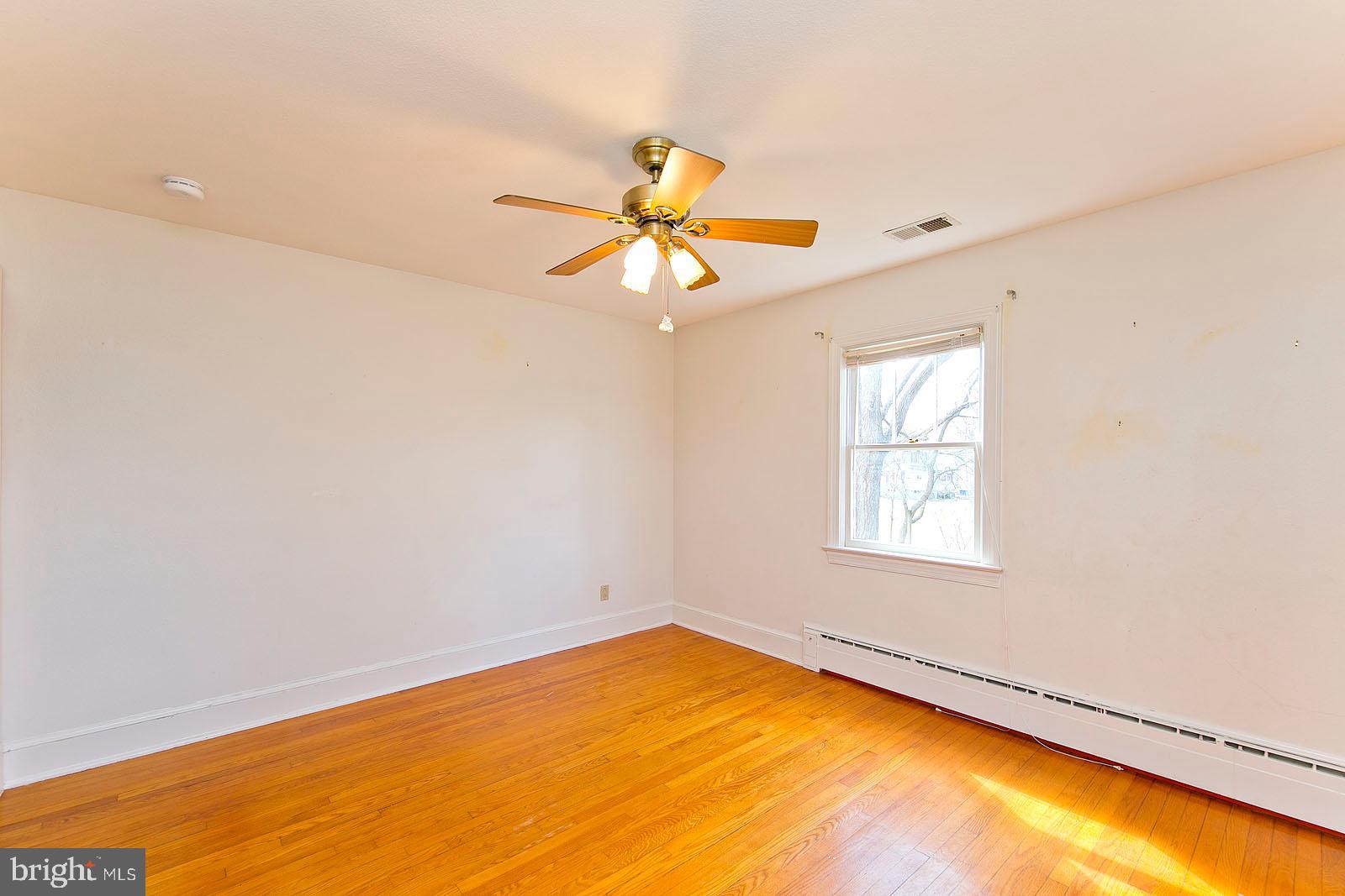 325 Berrys Ferry Road White Post, VA 22663 - Photo 27 of 60 a view of a room with a window and a ceiling fan