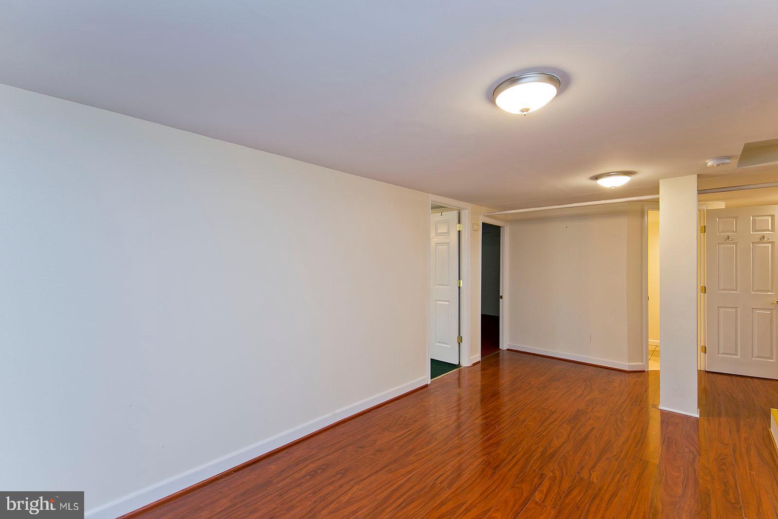 325 Berrys Ferry Road White Post, VA 22663 - Photo 31 of 60 a view of an empty room with wooden floor