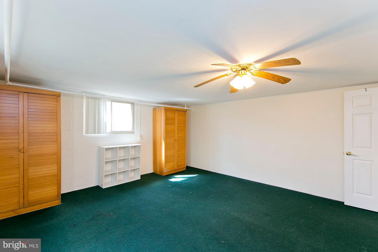 325 Berrys Ferry Road White Post, VA 22663 - Photo 37 of 60 a view of room with window and ceiling fan