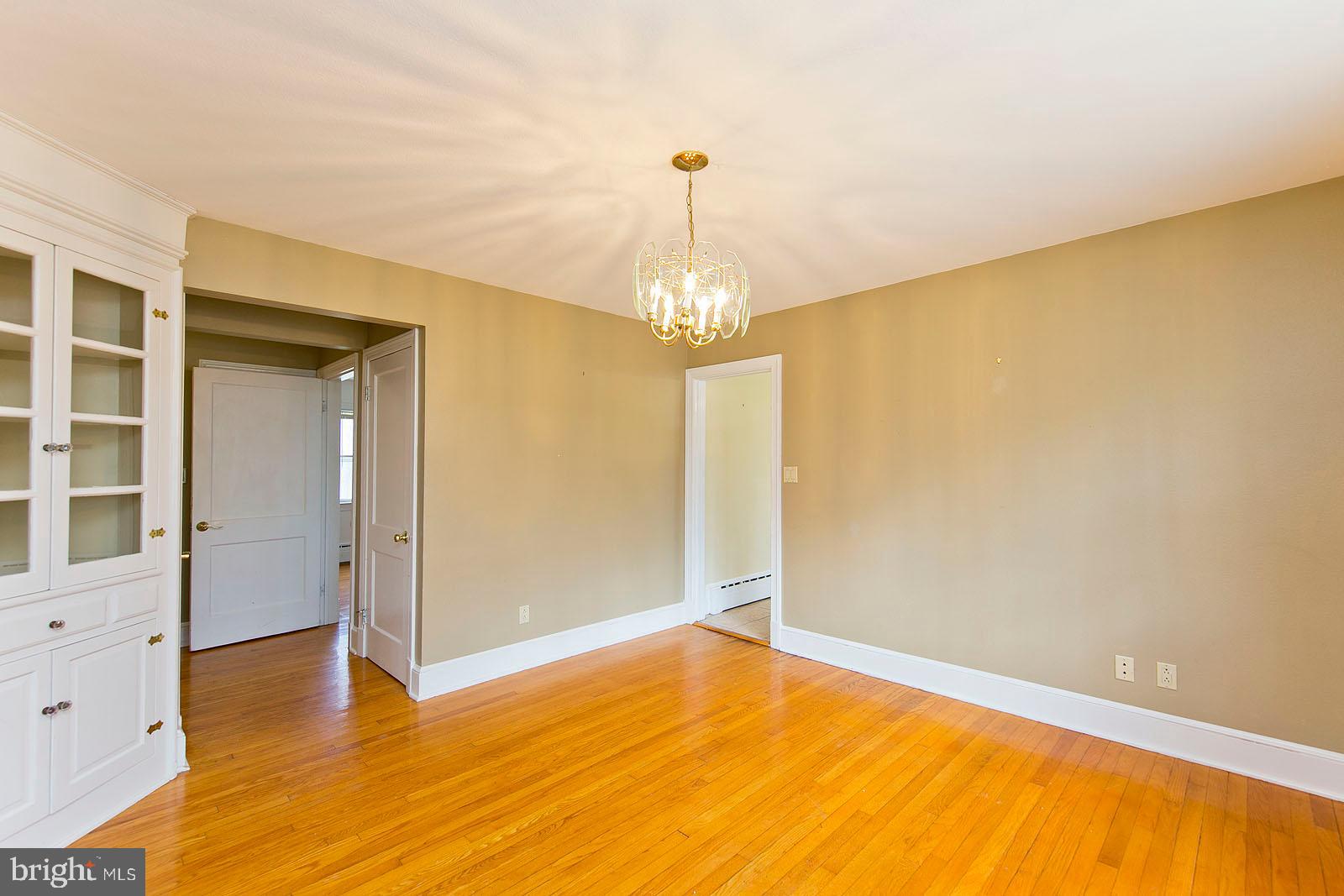 325 Berrys Ferry Road White Post, VA 22663 - Photo 6 of 60 wooden floor in an empty room with a window