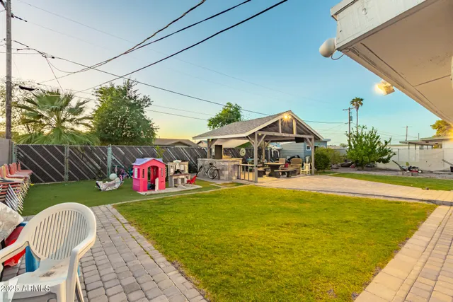 a view of swimming pool with seating space