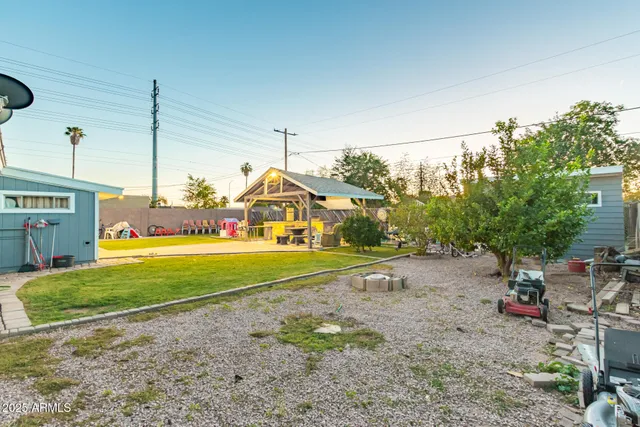 a view of yard with outdoor seating