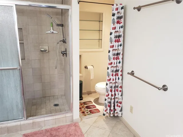 a bathroom with a shower and a sink
