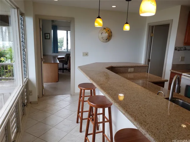 a view of a livingroom with furniture and window