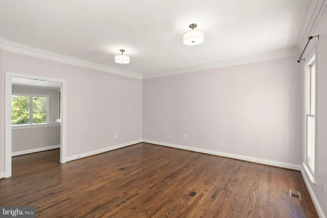 a view of an empty room and window