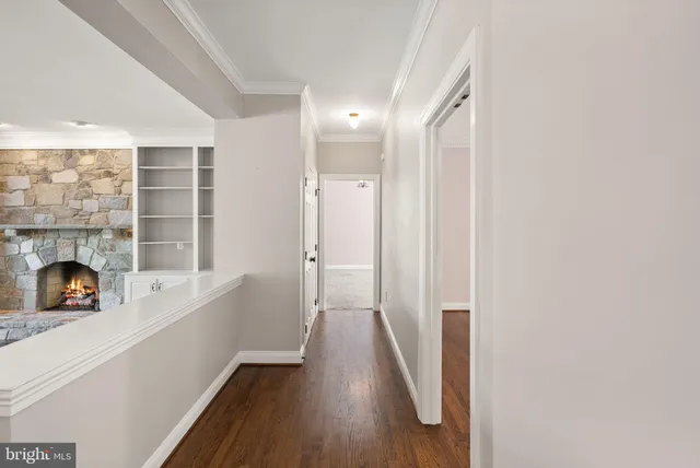 a bathroom with a toilet and shower