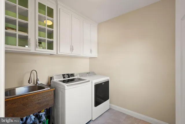 a view of a room with window and wooden floor