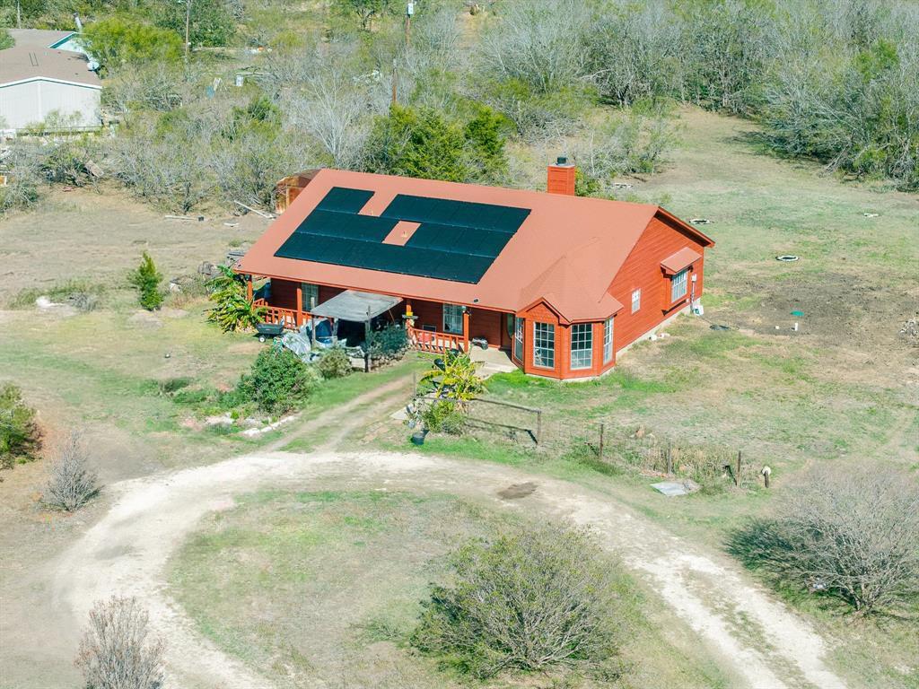 8548 Old Lockhart Road Buda, TX 78610 - Photo 3 of 19 an aerial view of a house with a yard