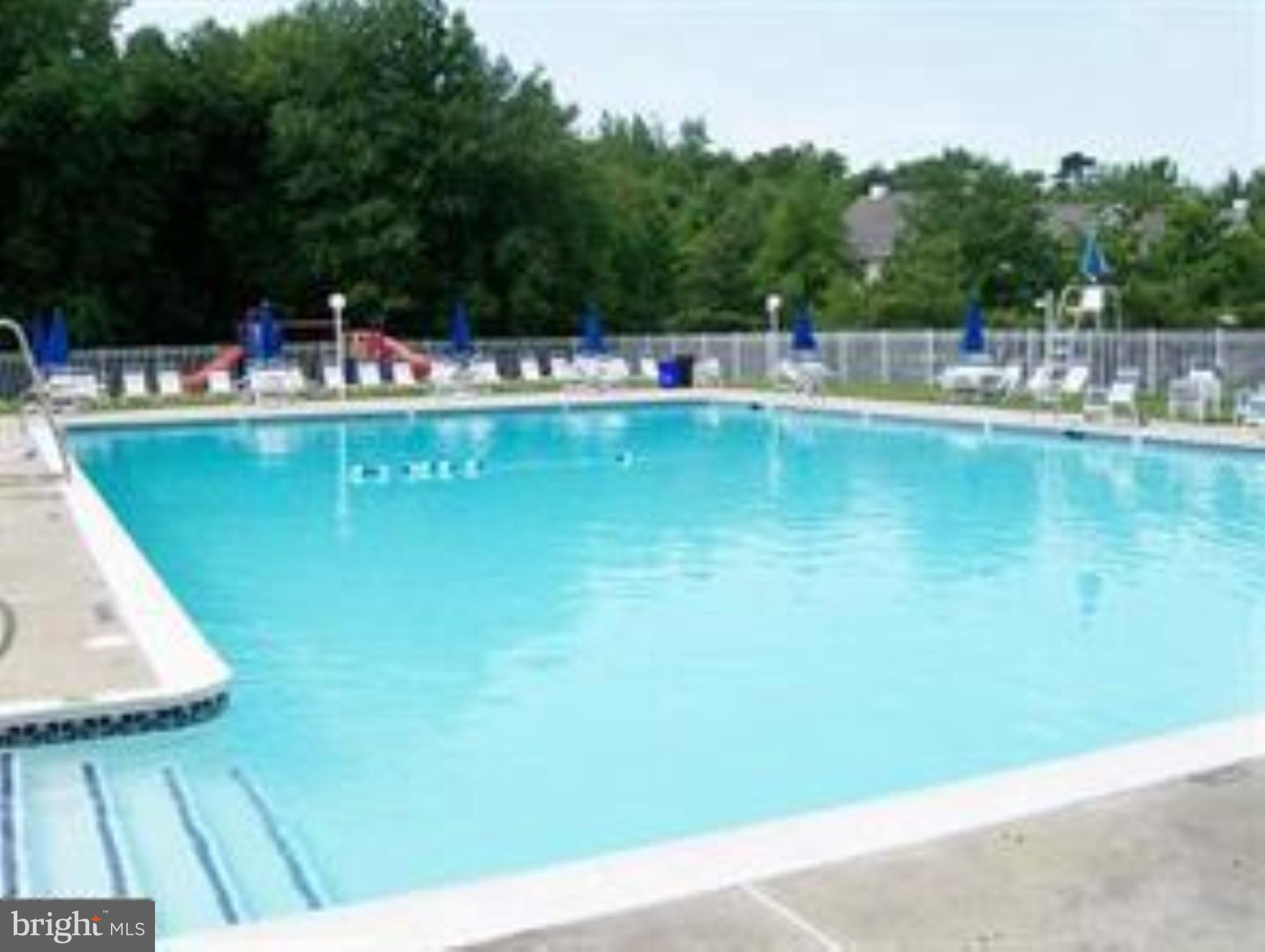 87 Eldon Way Marlton, NJ 08053 - Photo 19 of 22 a view of a swimming pool with a yard