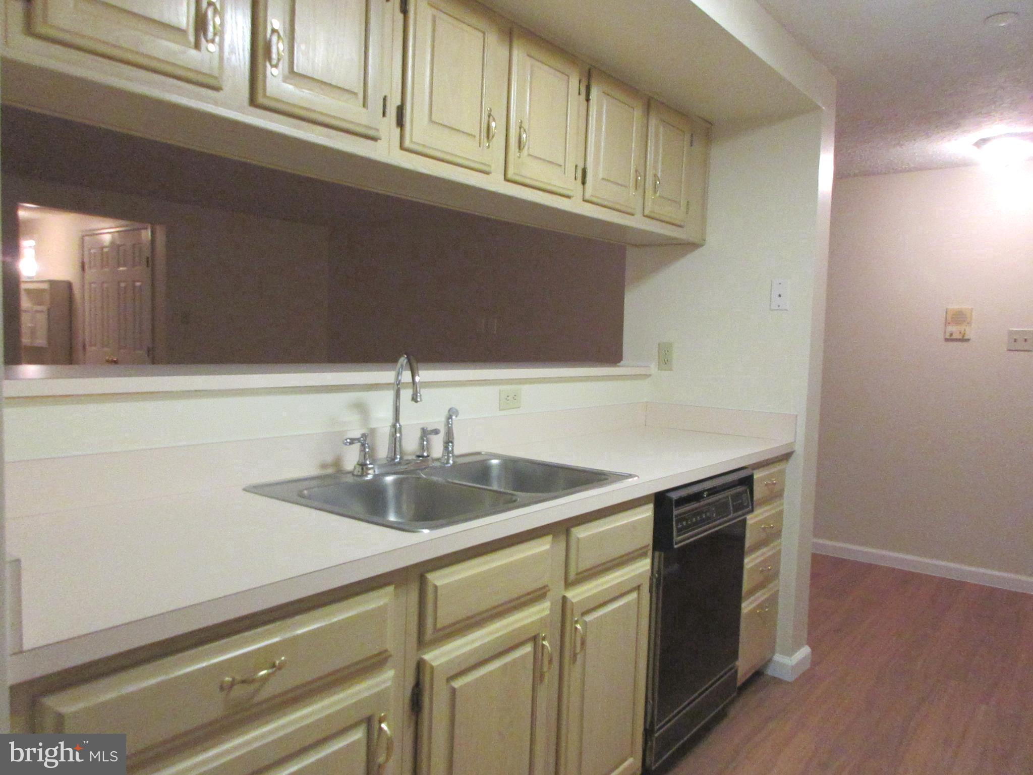 87 Eldon Way Marlton, NJ 08053 - Photo 4 of 22 a kitchen with a sink and cabinets
