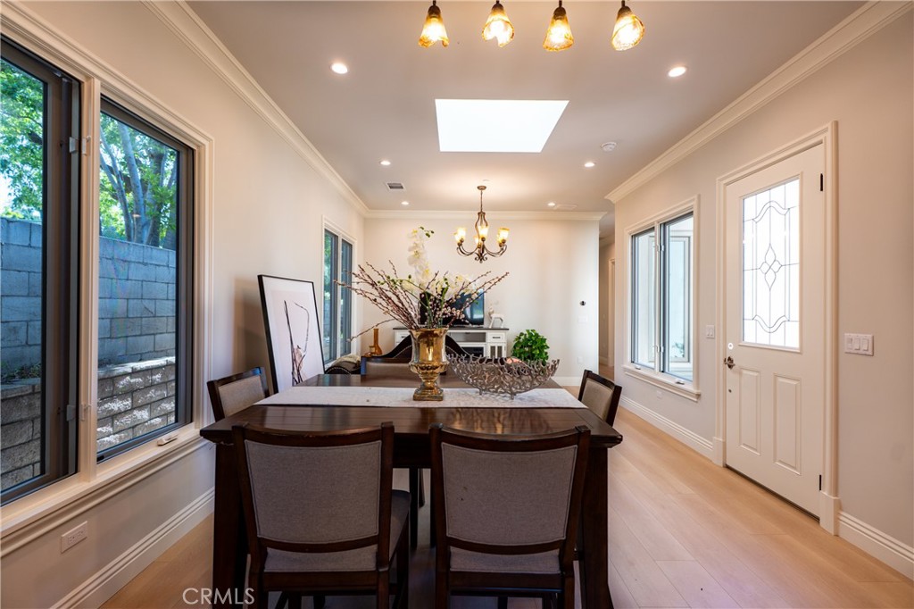 894 Fallen Leaf Road Arcadia, CA 91006 - Photo 11 of 28 a view of a dining room with furniture window and wooden floor