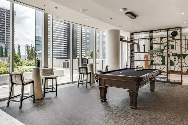 a view of balcony with wooden floor
