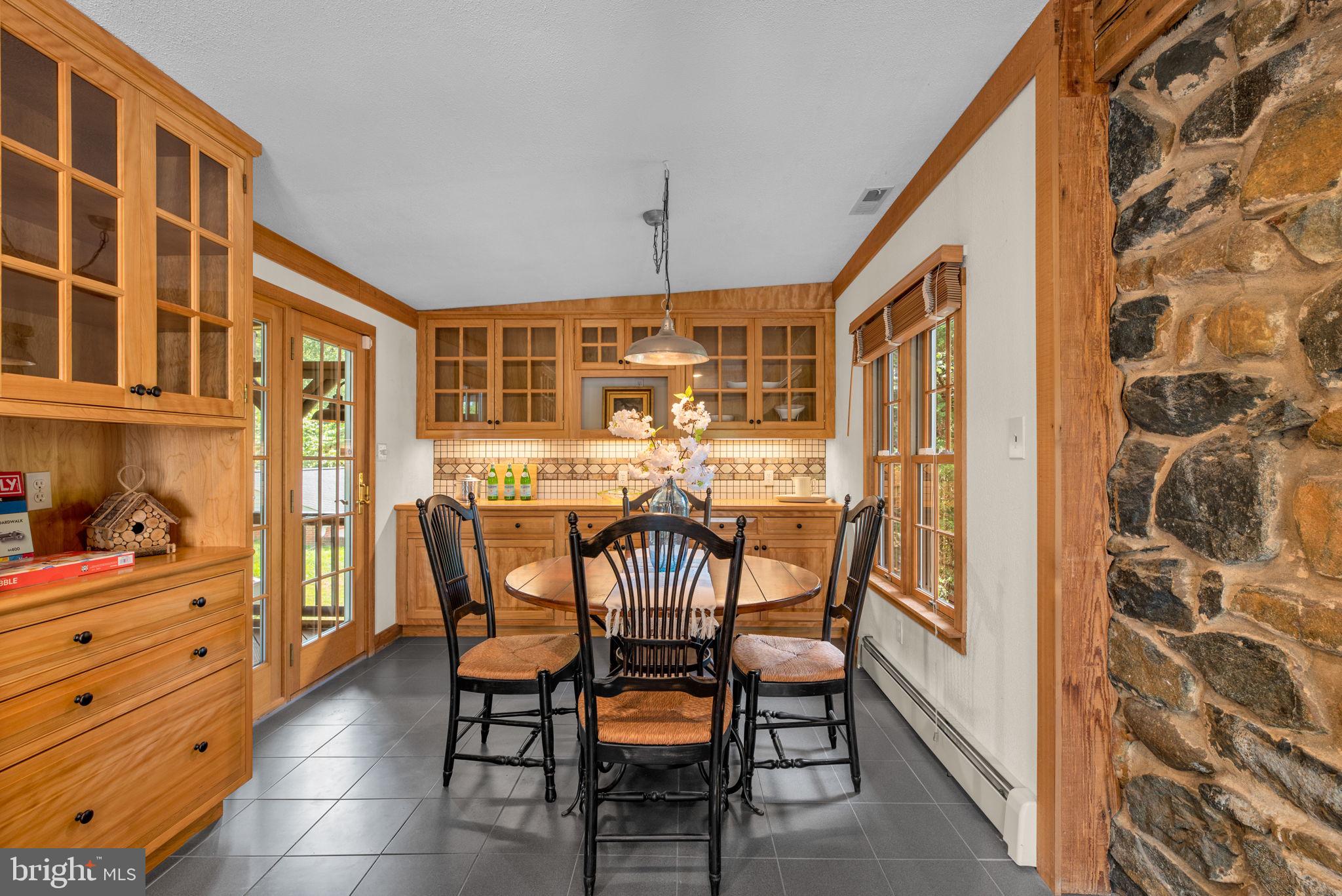 1703 Frederick Road Baltimore, MD 21228 - Photo 25 of 71 Built-ins & French doors to screened porch