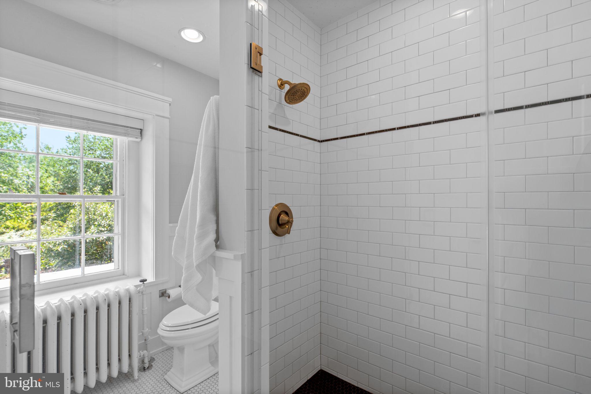 1703 Frederick Road Baltimore, MD 21228 - Photo 39 of 71 Glass enclosure and classic tile