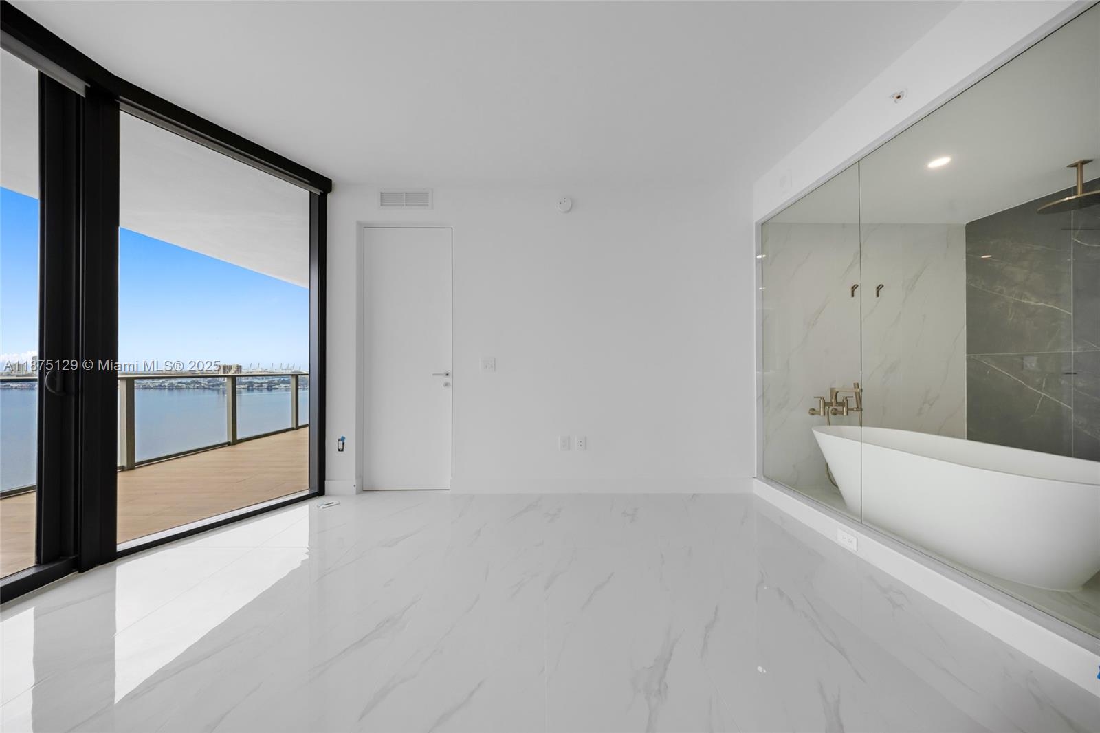 700 Northeast 24th Street, Unit 1706 Miami, FL 33137 - Photo 28 of 95 a view of an empty room