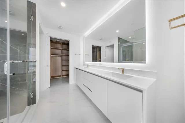 a view of swimming pool with outdoor seating and plants