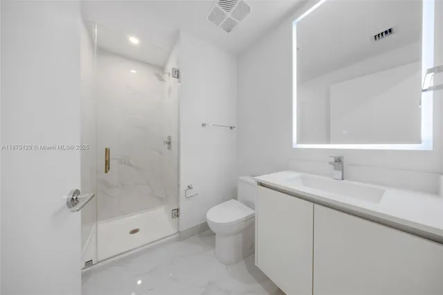 a balcony with chairs and a couch