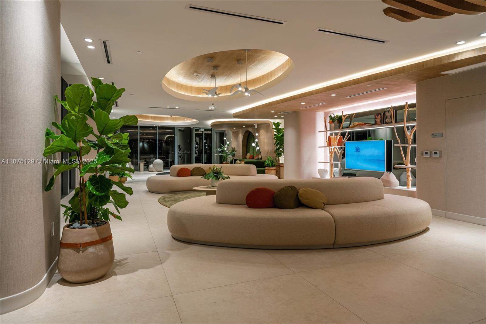 700 Northeast 24th Street, Unit 1706 Miami, FL 33137 - Photo 60 of 95 a living room with furniture and a potted plant