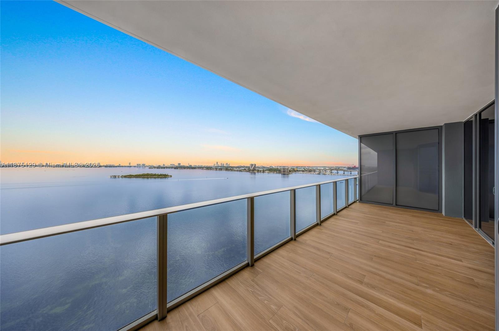 700 Northeast 24th Street, Unit 1706 Miami, FL 33137 - Photo 9 of 95 a view of a balcony with an ocean view