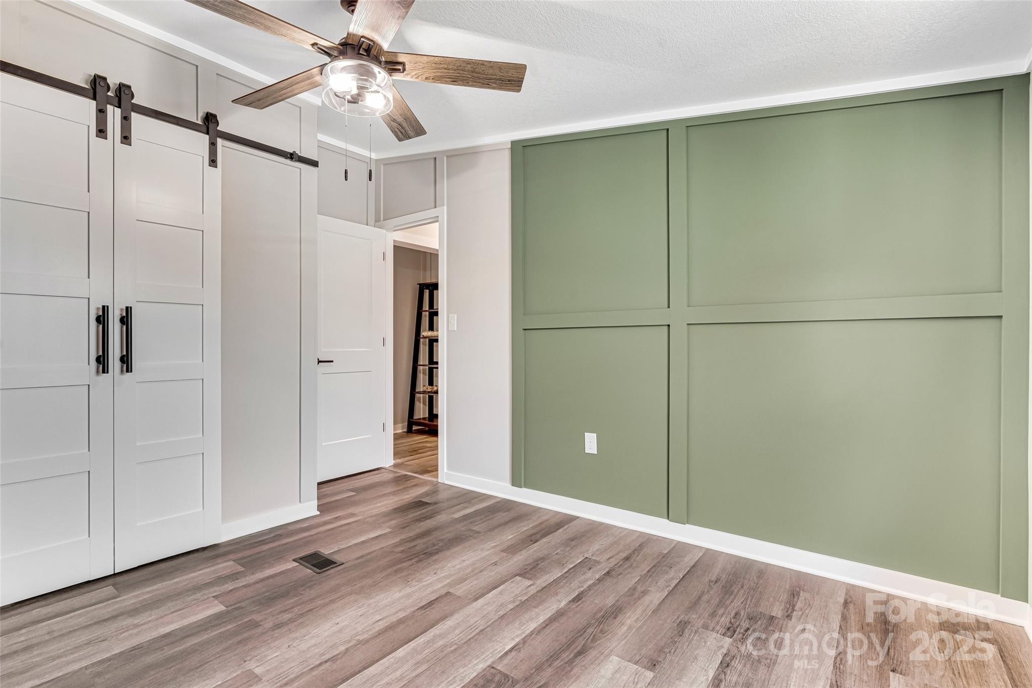 4881 Grassy Creek Road Denver, NC 28037 - Photo 21 of 25 a view of a room with an empty room