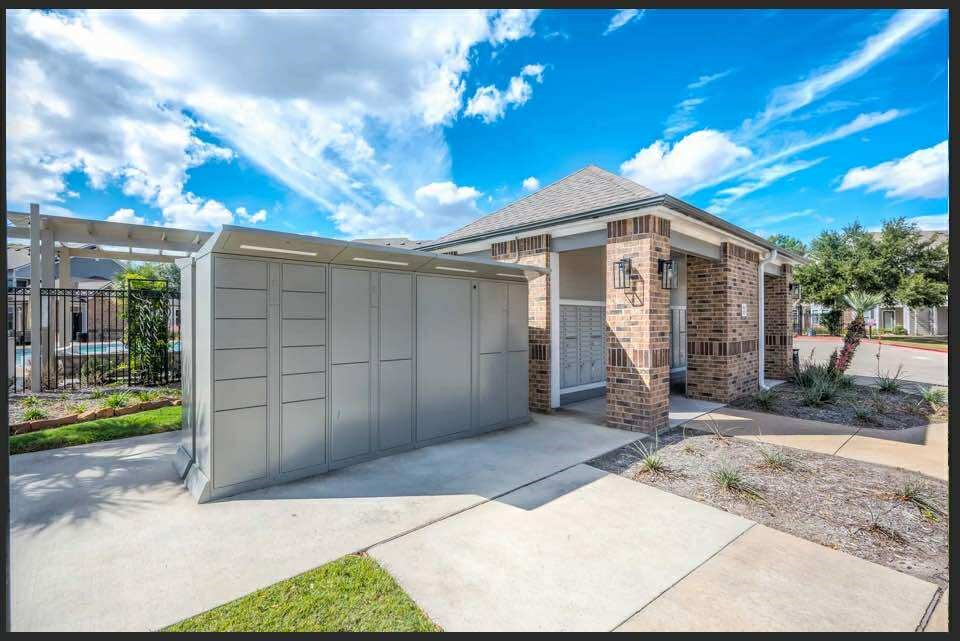 529 Barker-Clodine Road, Unit VERBANA Houston, TX 77094 - Photo 12 of 17 a view of a house with a yard