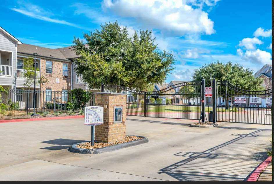 529 Barker-Clodine Road, Unit VERBANA Houston, TX 77094 - Photo 3 of 17 a sign board with buildings