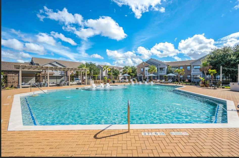 529 Barker-Clodine Road, Unit VERBANA Houston, TX 77094 - Photo 9 of 17 a view of swimming pool with a yard