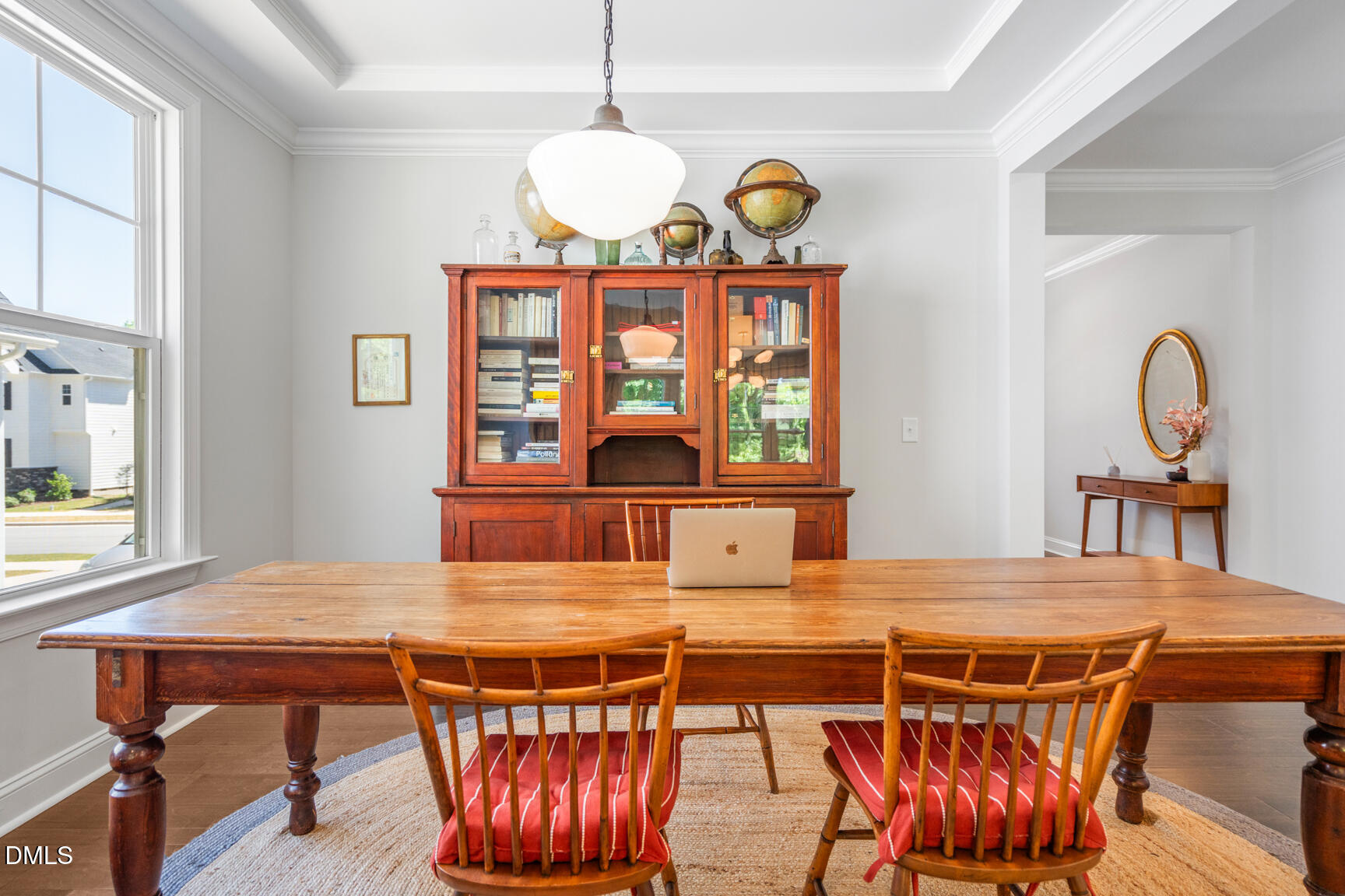 2966 Rise And Shine Road Apex, NC 27502 - Photo 11 of 61 a view of a dining room with furniture and chandelier