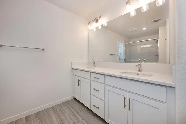 a view of an house with backyard and porch