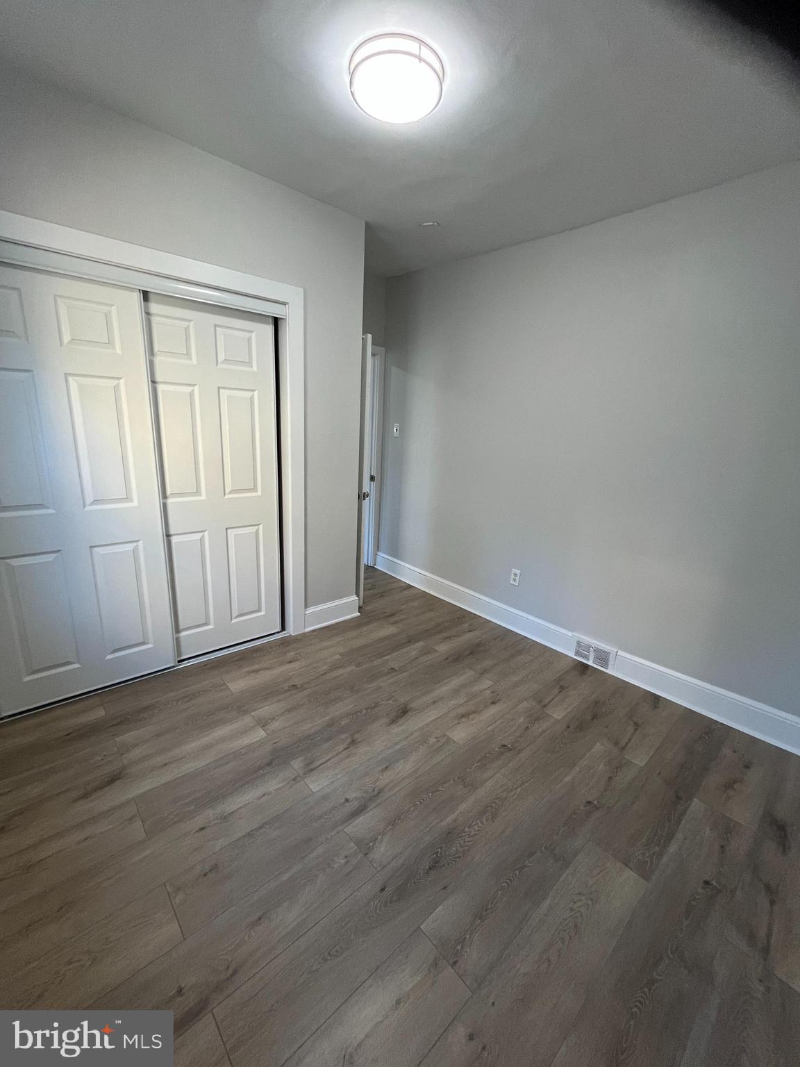 105 Mecray Lane Maple Shade, NJ 08052 - Photo 12 of 32 an empty room with wooden floor