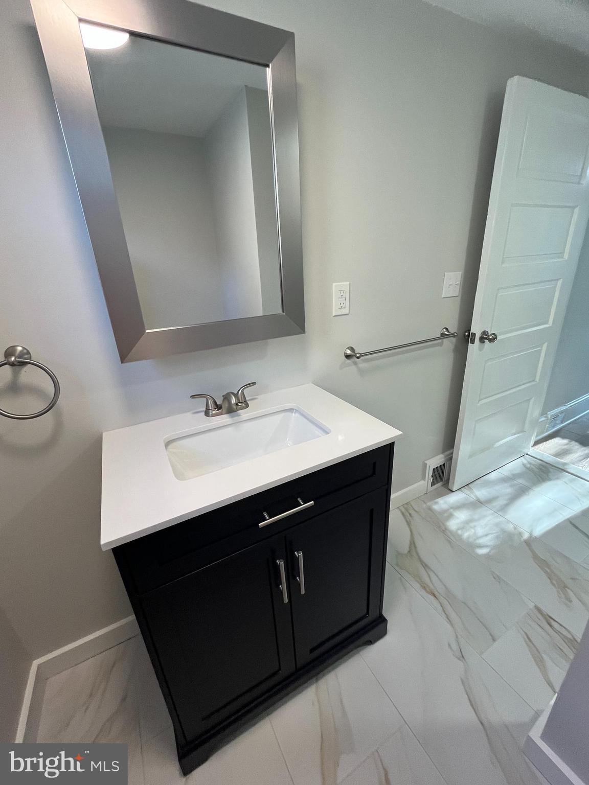 105 Mecray Lane Maple Shade, NJ 08052 - Photo 15 of 32 a bathroom with a sink vanity and a mirror