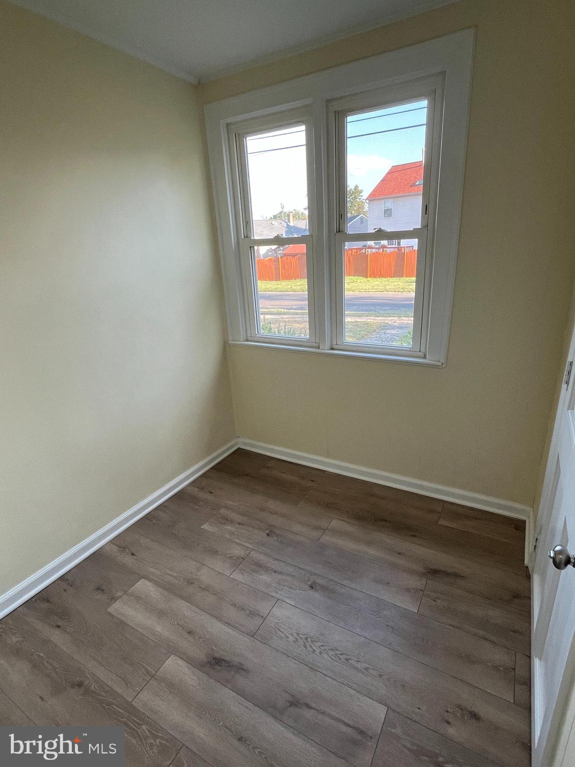 105 Mecray Lane Maple Shade, NJ 08052 - Photo 19 of 32 an empty room with wooden floor and windows