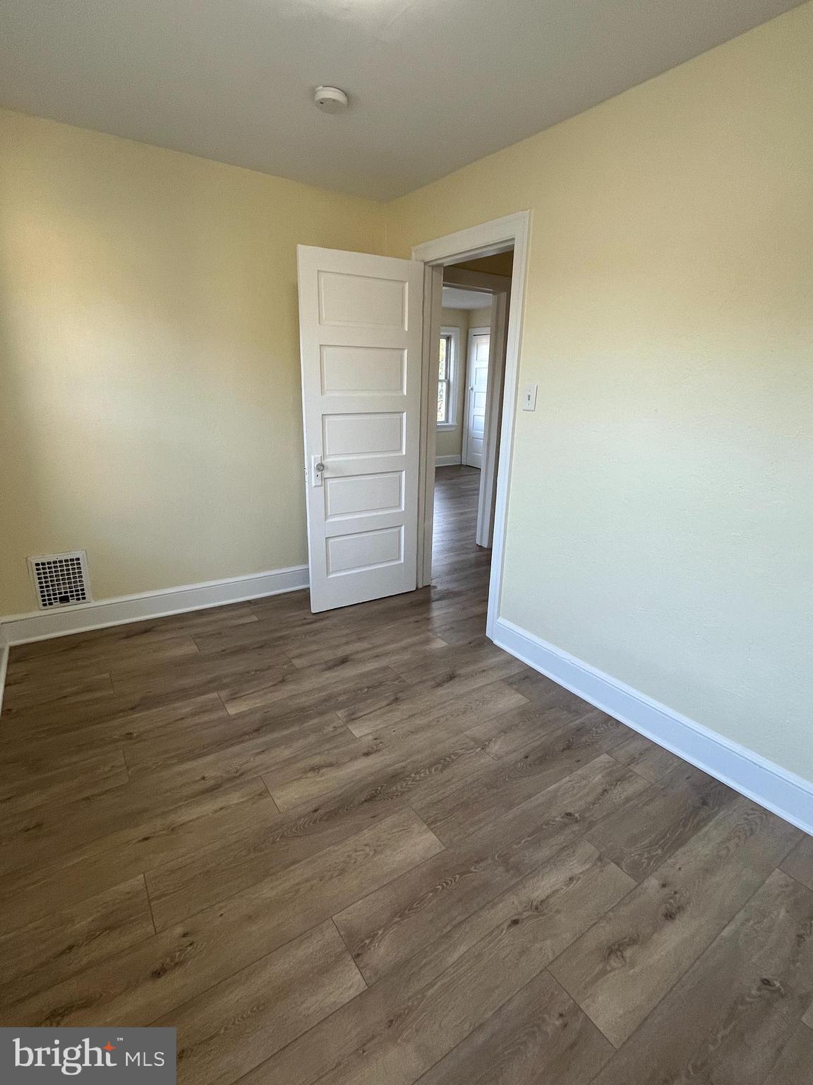 105 Mecray Lane Maple Shade, NJ 08052 - Photo 29 of 32 an empty room with wooden floor & windows