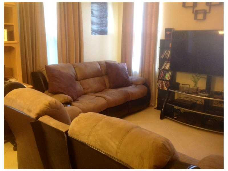 6582 West Sample Road, Unit 6582 Coral Springs, FL 33067 - Photo 3 of 14 Living Room