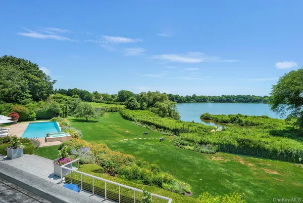 a view of a lake with a yard