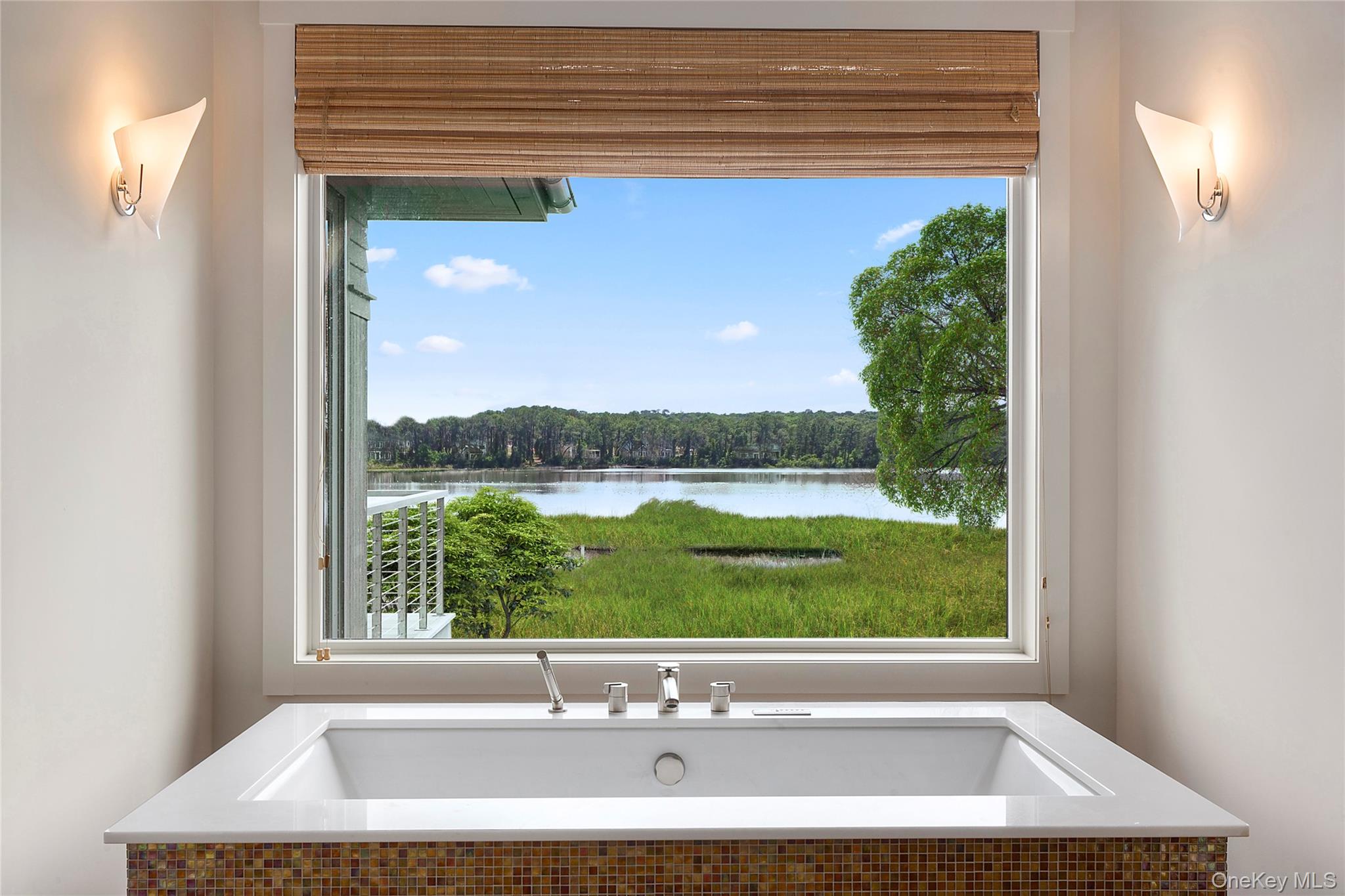 316 Deerfield Road Water Mill, NY 11976 - Photo 15 of 22 a bathroom with a window sink and mirror